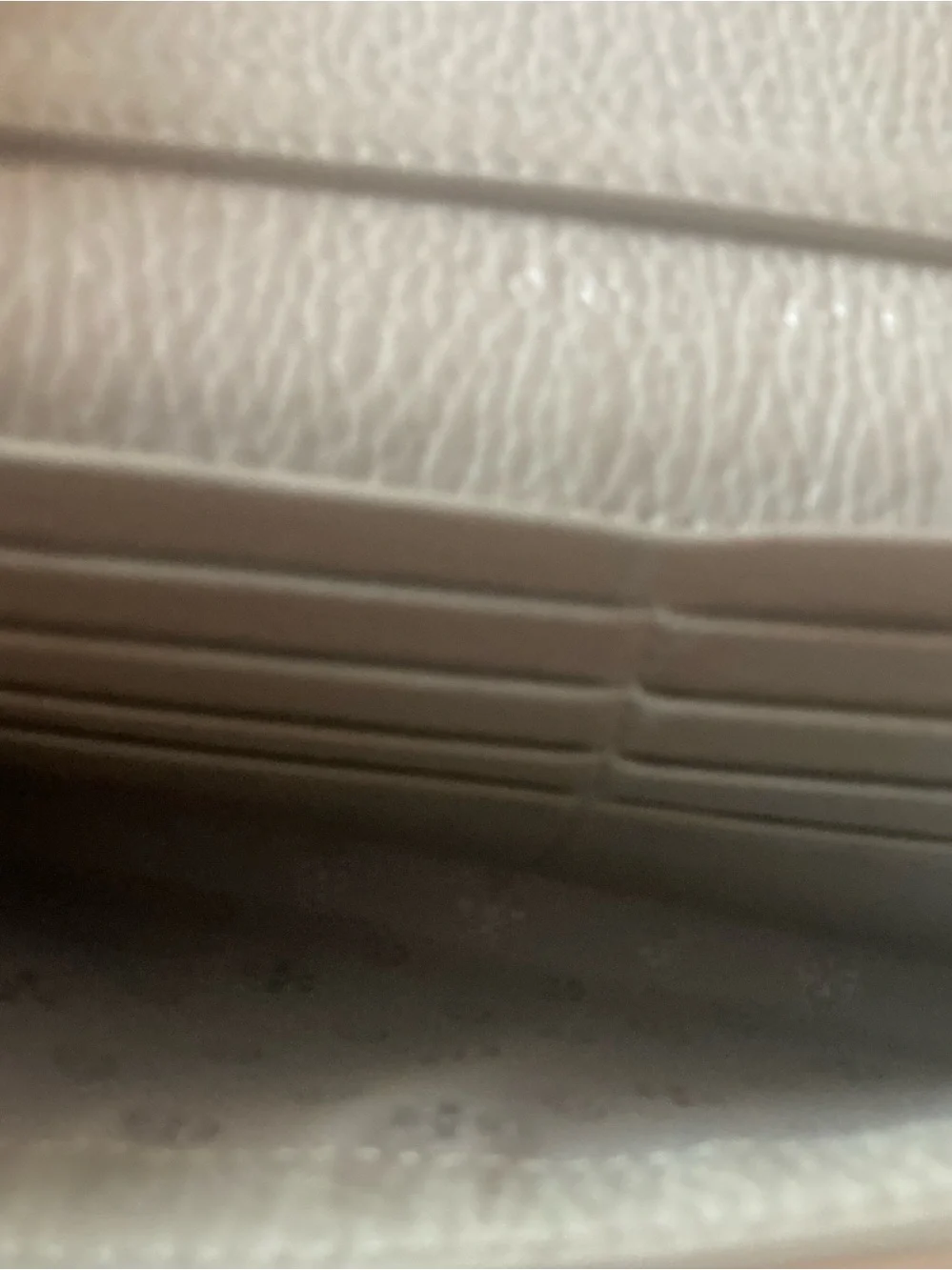 Tory Burch Pebbled Crossbody Wallet in Gray with beautiful silver logo